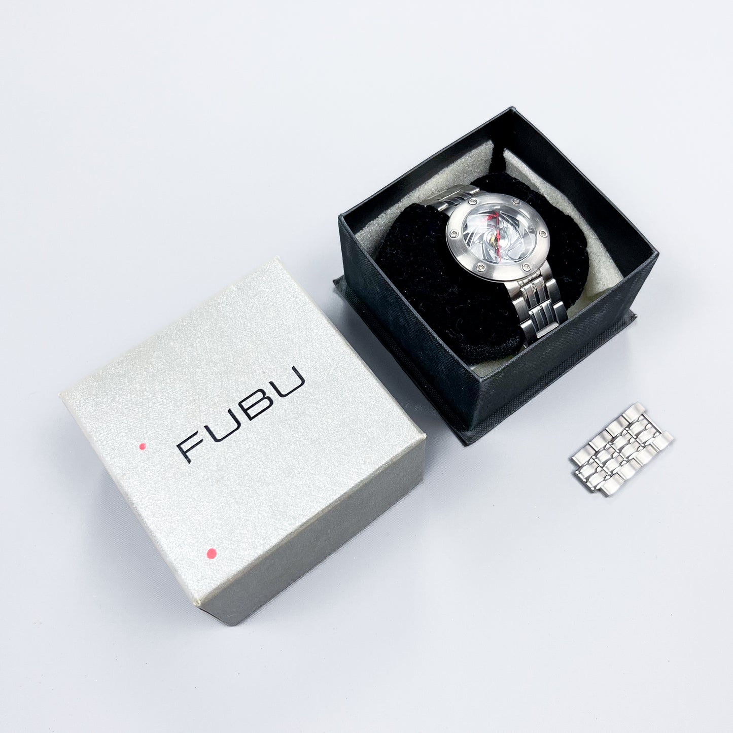 FUBU Spiral Alloy Wheel Skeleton Watch