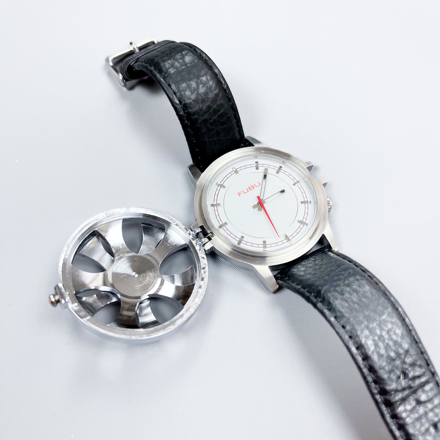FUBU Spinning Alloy Wheel Watch