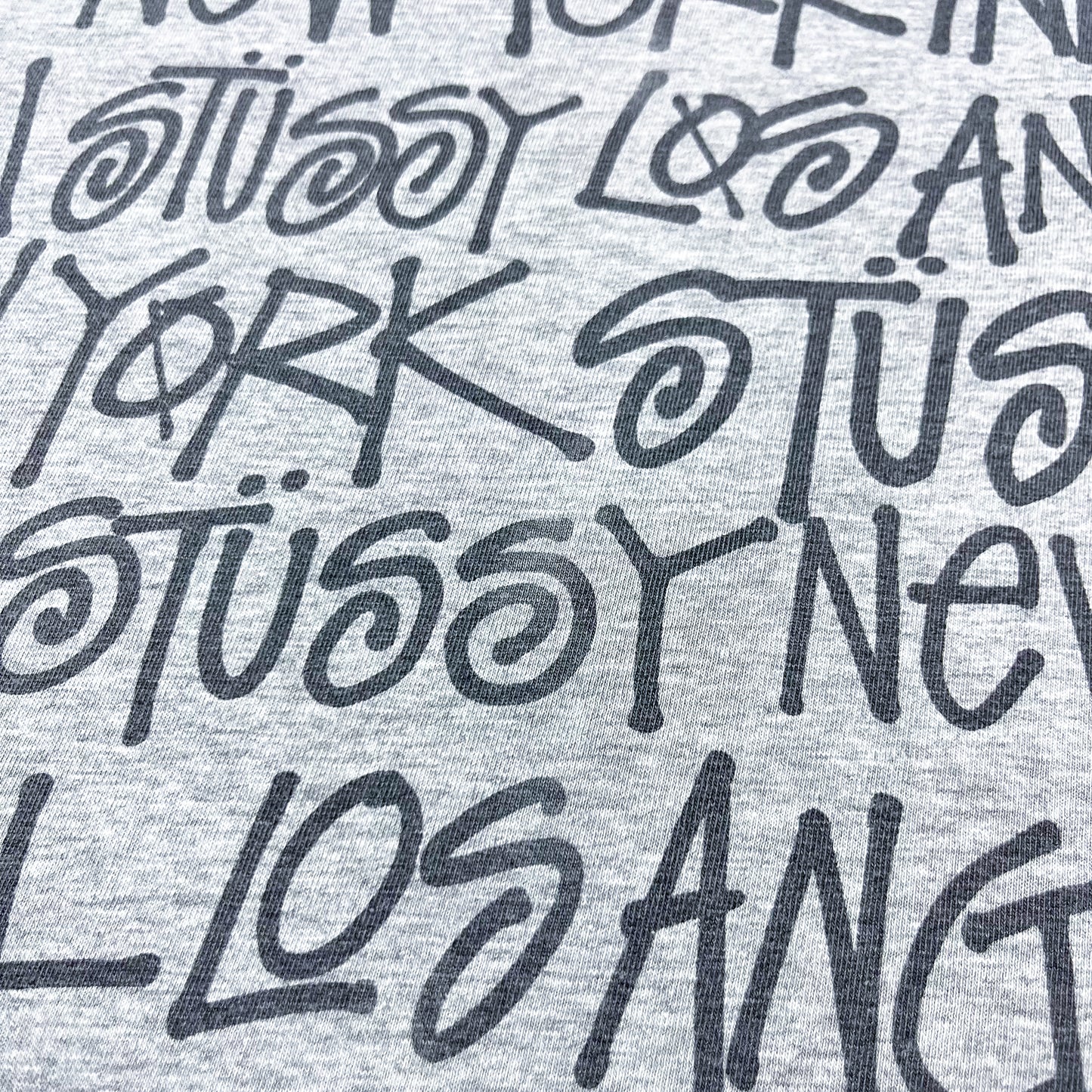 Stüssy All Over Spellout T-shirt - Size: Medium - Grey