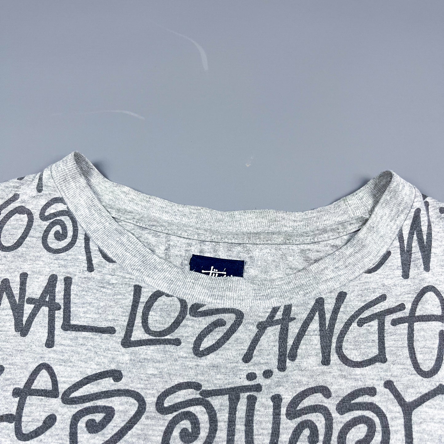 Stüssy All Over Spellout T-shirt - Size: Medium - Grey