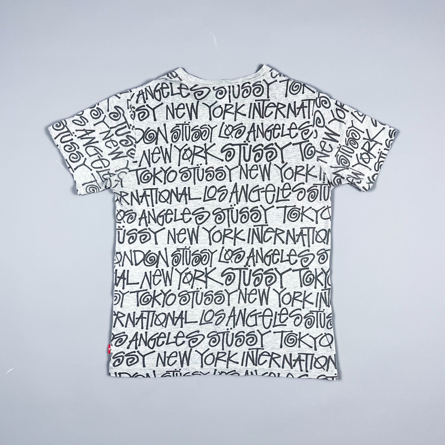 Stüssy All Over Spellout T-shirt - Size: Medium - Grey