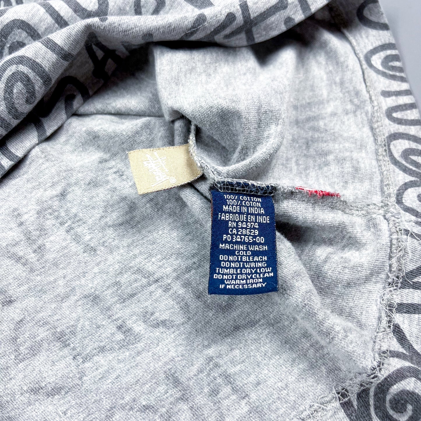Stüssy All Over Spellout T-shirt - Size: Medium - Grey